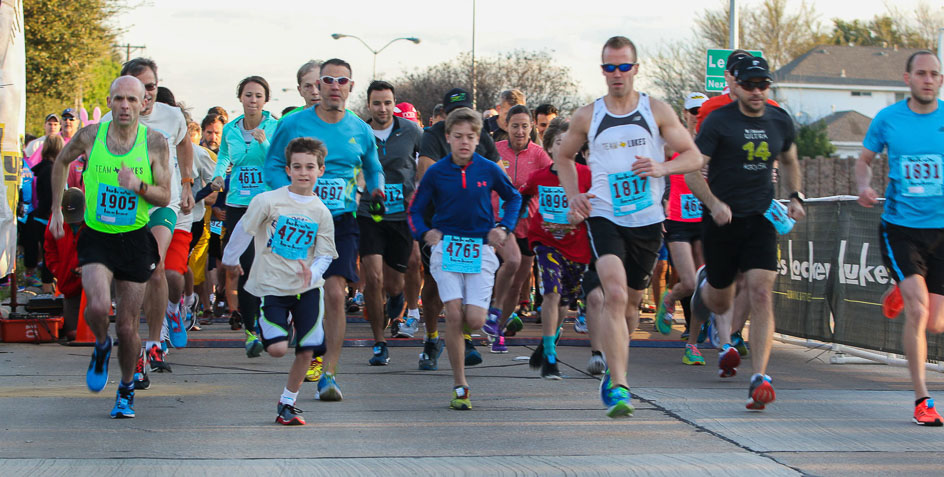 people running in a 5K race